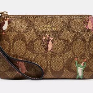 NWT Coach Corner Zip Wristlet In Signature Canvas With Party Animals Print